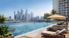 Beachfront Bliss - Apartment with Pool and Premium Amenities
